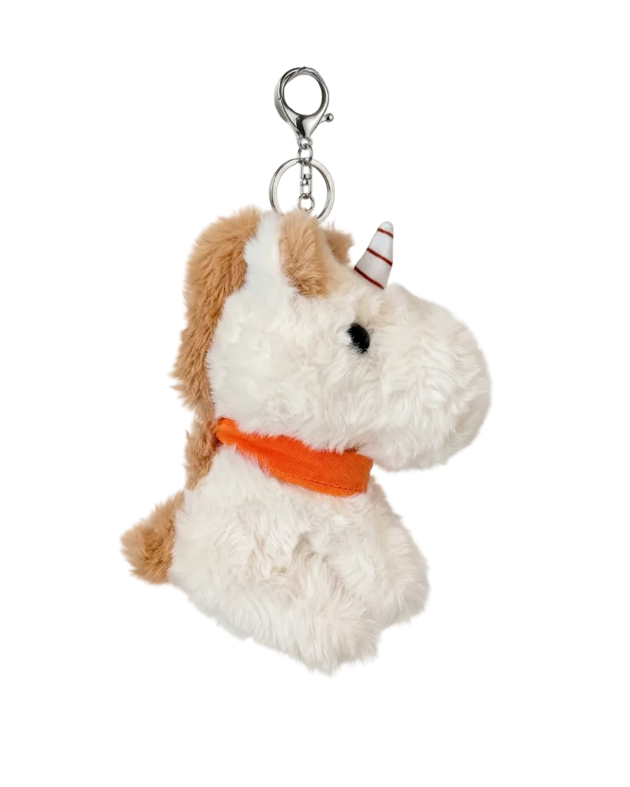 Plush unicorn keychain with a brown mane and orange harness on a white background