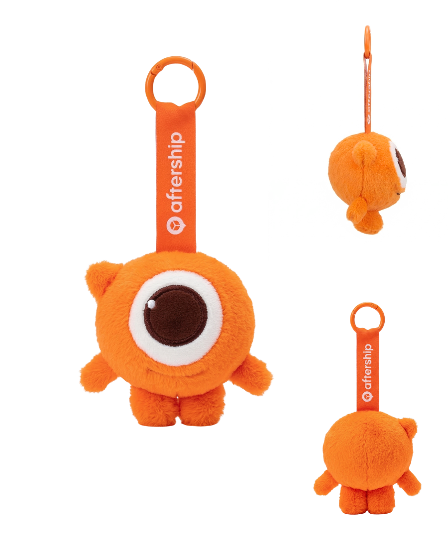 Set of three orange plush toys with a single eye design, each attached to an 'aftership' tag on a white background.