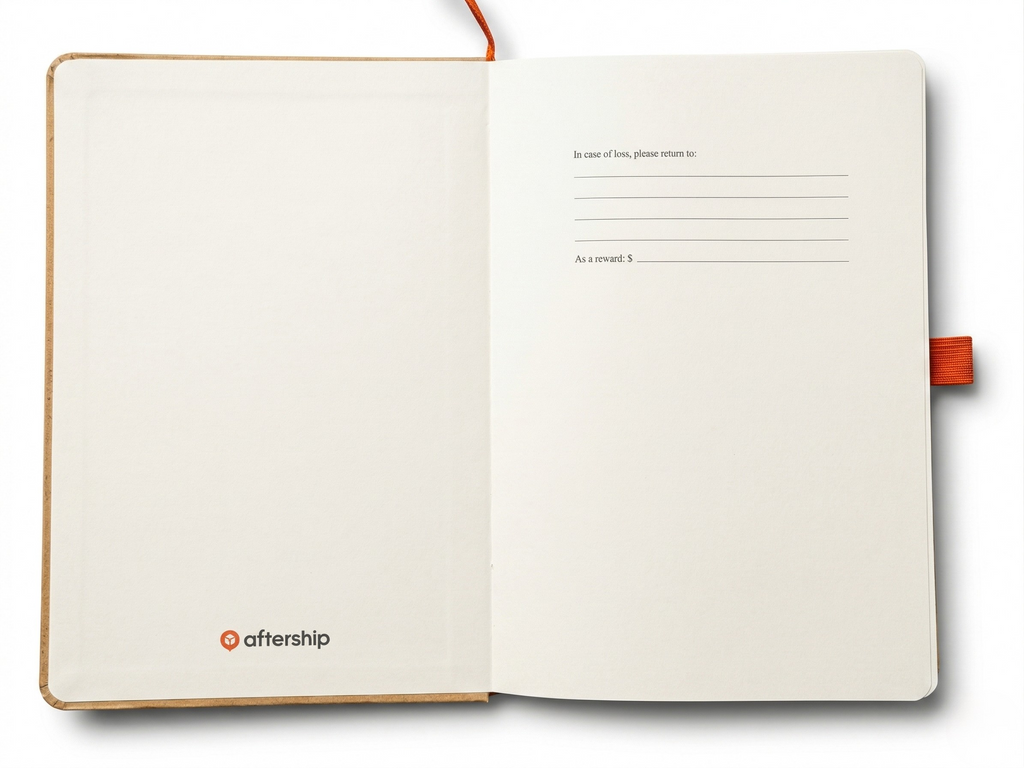Open notebook with a visible brand logo on a white background